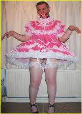 Cross-dressing faggot with limp caged dick