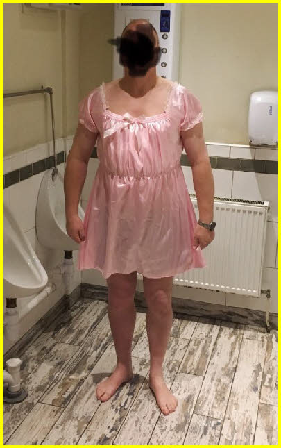Scottish sissy slut Emily wears a pink satin dress in the gents toilets Scottish sissy slut Emily wears a pink satin dress in the gents toilets