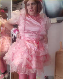 Mincing faggot in frilly pink frock Mincing faggot in frilly pink frock