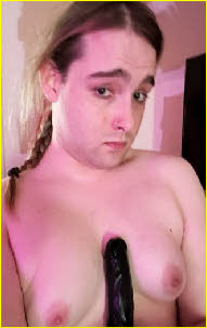 Trans sissy Natalie with bare breasts