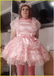 Grown man transforms into simpering pink pansy Grown man transforms into simpering pink pansy