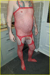 Sissy Charlotte in red fishnet body stocking Sissy Charlotte in red fishnet body stocking