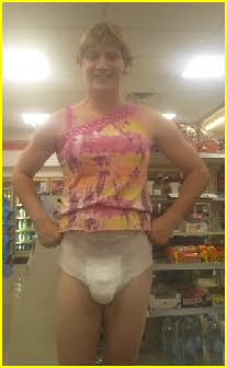Sissy Brandon in girlie top and nappy