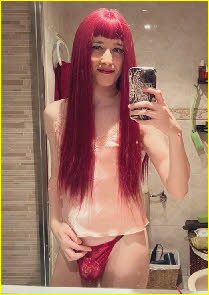 Redheaded sissy slut Tatiana dressed in tight red panties