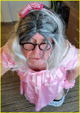 Pathetic pink fairy Paula exposed in sissy maid outfit