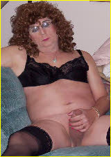 Sissy slut BillieJo jerks off in a black bra and stockings