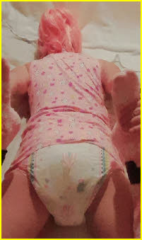 Stupid adult baby Lily rolling around in nappies