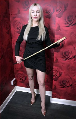 Miss Jessica Wood with spanking implement
