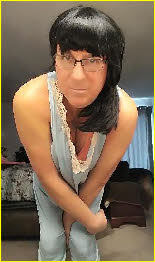 Sissy in black wig