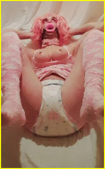 Dumb sissy Lily exposed in fetish mask and diapers