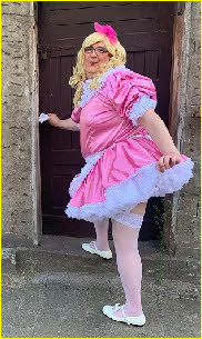 Cologne sissy Olivia alll dolled up in a lacy pink French maid uniform