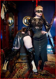 Edinburgh dominatrix prepares to thrash slave