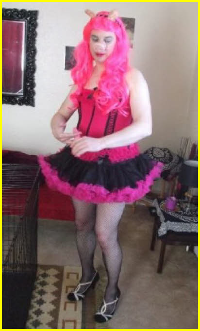 Sissy in pig mask
