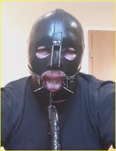 Tragic German slave in a gimp mask Tragic German slave in a gimp mask