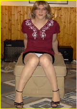 Sissy Janey Lynn gives a panty peek in short black skirt