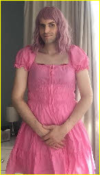 Cross-dressing sissy Sasha wears pathetic pink dress