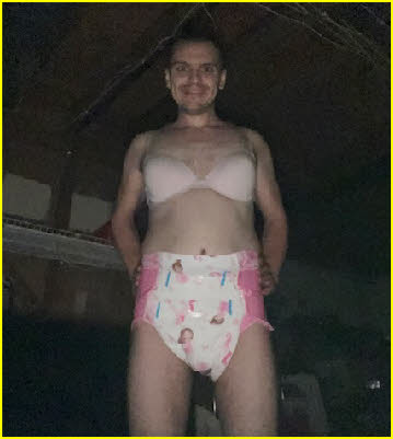 Sissy Pampers exposed in pink bra and diapers