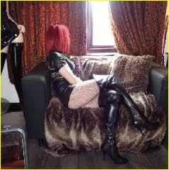 Sissy slut in kinky boots and fishnets