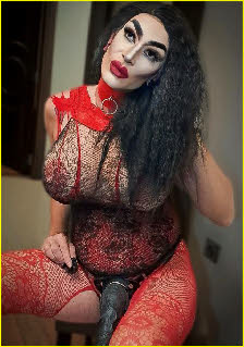 Stunning sissy slut Maria wearing enormous fake boobs and strap-on cock