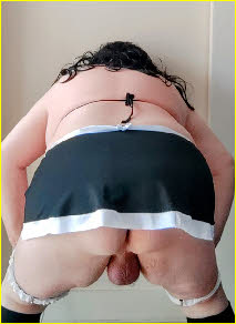 Sissy slut Geoffrey bends over in a slutty French maid uniform