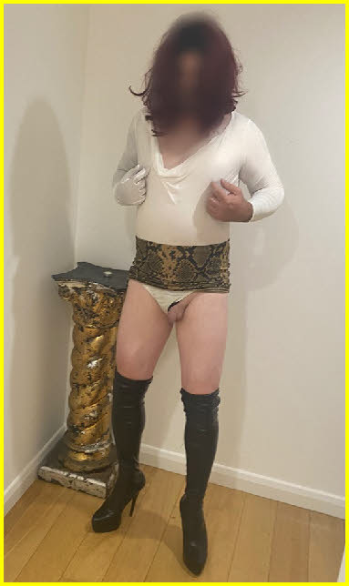 Sissy Beth's tiny little penis pokes out of his girlie knickers Sissy Beth's tiny little penis pokes out of his girlie knickers