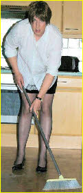 Submissive sissy maid Vicki sweeps the floor