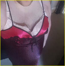Sissy male with hairy chest in pink bra