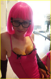 Pink-wigged sissy wearing fake boobs