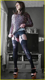 Cross-dressing sissy Paula exposing his sexy black panties