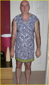 Bald hairy loser Malcolm sissified in feminine summer dress Bald hairy loser Malcolm sissified in feminine summer dress