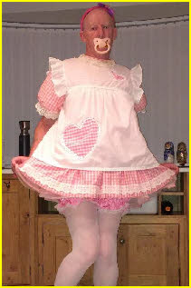 Cross-dressing adult baby girl sucks dummy