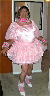 Sissy Michelle fully feminised in frilly pink frock