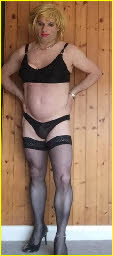 Sissy transvestite in black lingerie