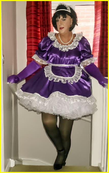 Grown man in elaborate sissy maid uniform