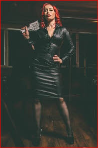 London domme Mistress Eloise with spanking paddle