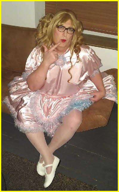 German Sissy Olivia exposed in an outrageously feminine and silky dress