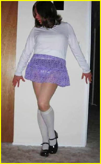 Glasgow sissy in swishy skirt and knee-high socks