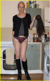 Exposed sissy Rachel removes his wig for total exposure