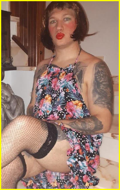 Tragic pansy Ruby exposed in a floral dress and stockings Tragic pansy Ruby exposed in a floral dress and stockings