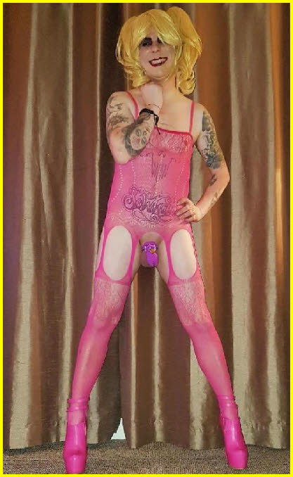 Sissy transvestite Tammy in crotchless pink bodystocking