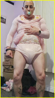Adult baby Daniel exposed in pink nappy Adult baby Daniel exposed in pink nappy