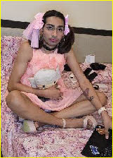 Pink pansy Maddy cross-dressing in sissy attiire