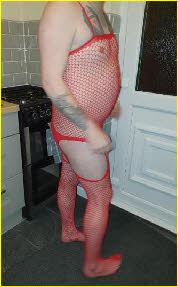 Sissy slut in red fishnets Sissy slut in red fishnets