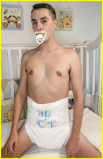 Sissy loser DiaperKing exposed sucking dummy in diapers