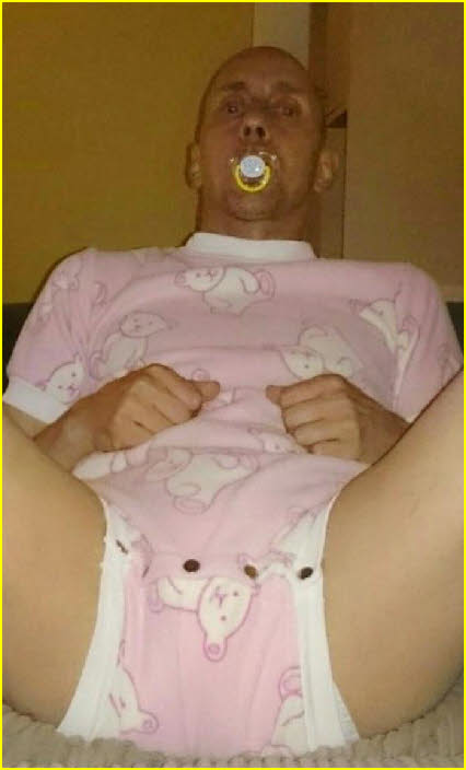 Cross-dressing adult baby in nappies