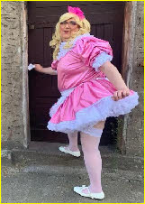 Humiliated loser male in ridiculous French maid uniform