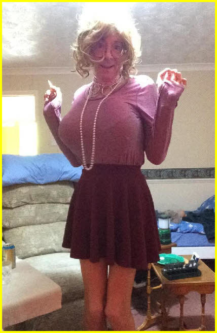Failed male loser mincing around in girlie attire Failed male loser mincing around in girlie attire