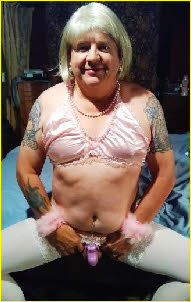 Failed male exposed in sissy pink underwear and clit cage