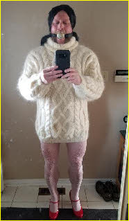 Ball-gagged sissy loser Scott wearing girlie sweater and red high heels Ball-gagged sissy loser Scott wearing girlie sweater and red high heels