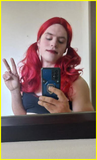 Feminised sissy Rikkie from South Africa takes selfie in red wig